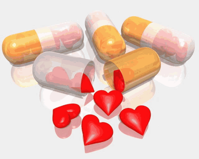 a bunch of pills with red hearts inside of them