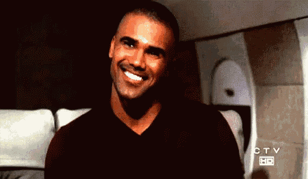 a man is smiling in front of a sign that says ctv