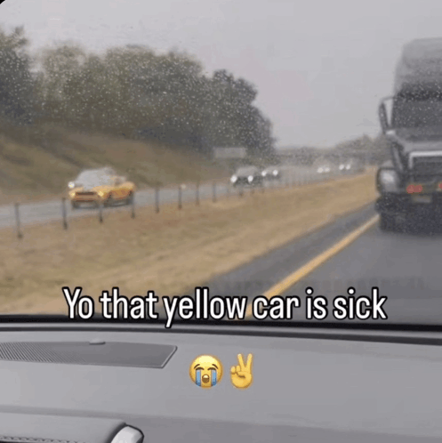 a yellow car is driving down a highway with a sticker that says yo that yellow car is sick