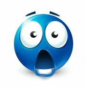a blue smiley face with big eyes and a surprised expression on its face .
