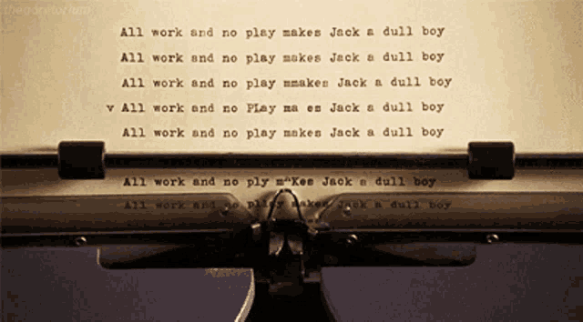 a typewriter with the words " all work and no play makes jack a dull boy " on it