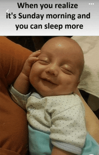 a baby is smiling with the caption " when you realize it 's sunday morning and you can sleep more " above it