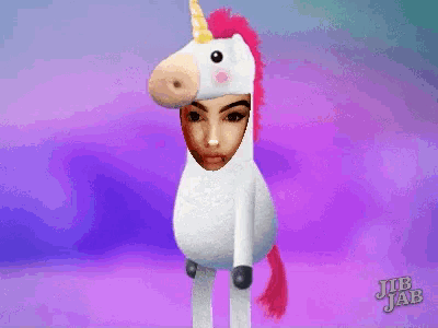 a woman is dressed in a unicorn costume with a purple background