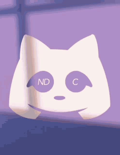 a white cat with purple eyes has the letters nd and c on it