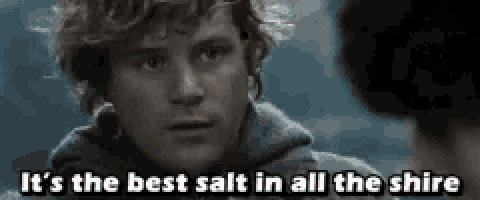 a man with curly hair is looking at another man and says it 's the best salt in all the shire .