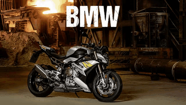 a bmw motorcycle is parked in a warehouse