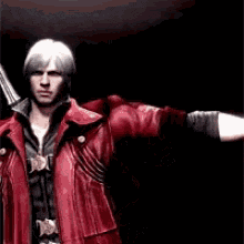 a man in a red jacket is holding a gun in his right hand .