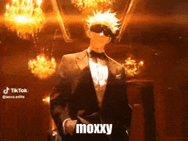 a man in a tuxedo and bow tie is dancing in a room with chandeliers .