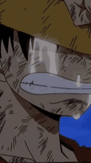 a close up of a cartoon character 's face with a tear running down his face