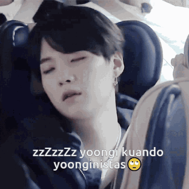 a close up of a person 's face with the words zzzzzz yoongi kuando yoonginistas above it
