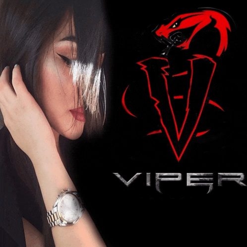 a woman wearing a watch stands in front of a logo for viper