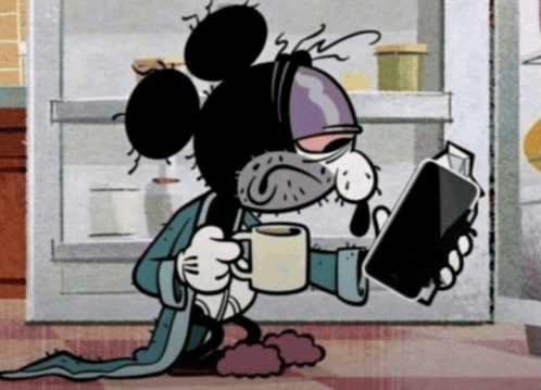 a cartoon of mickey mouse holding a cup and a cell phone