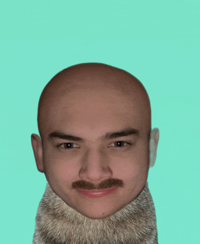 a bald man with a beard and mustache looks at the camera