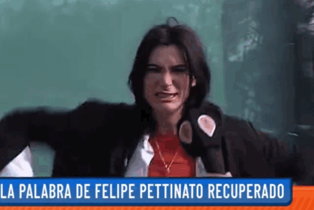 a woman holding a microphone with the words la palabra de felipe pettinato recuperado