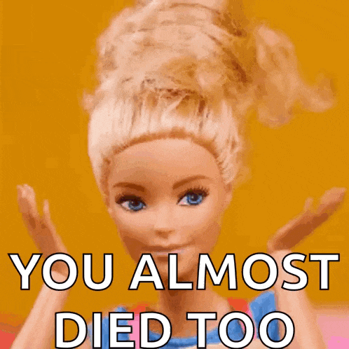 a barbie doll says you almost died too with her hands up
