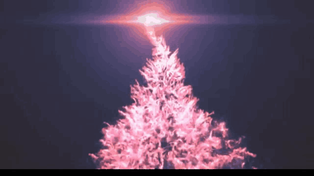 a pink christmas tree with a light coming out of the top of it