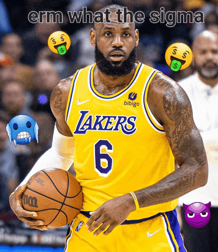 a basketball player for the lakers is holding a ball