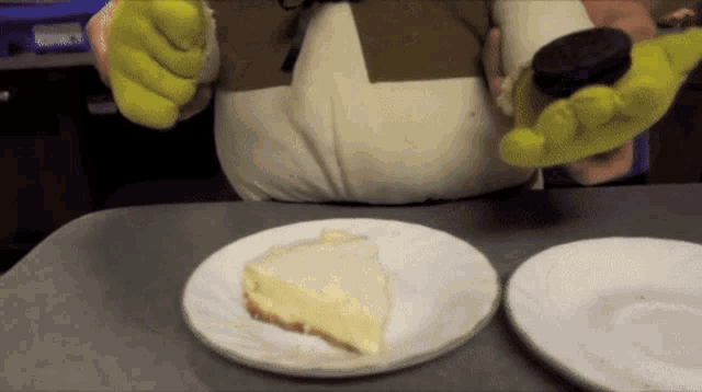 shrek is holding an oreo cookie and a piece of cheesecake