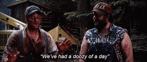 two men are standing next to each other and one of them is wearing a hat that says " beer "