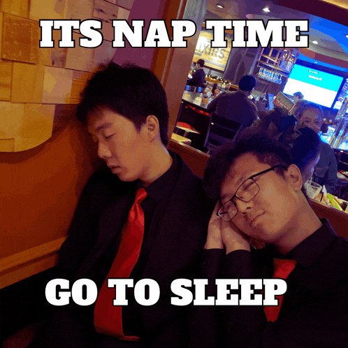 two men are sleeping in a restaurant with a caption that says its nap time go to sleep