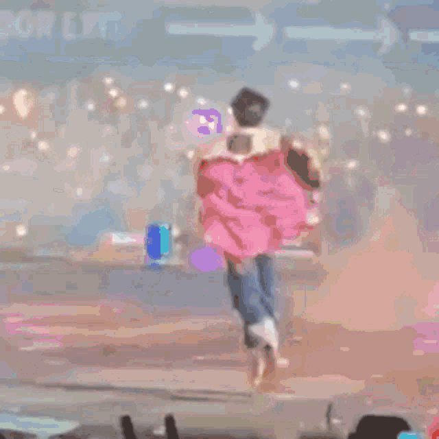 a blurry picture of a person on a stage