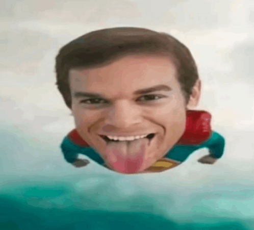 a man in a superman costume with his tongue out