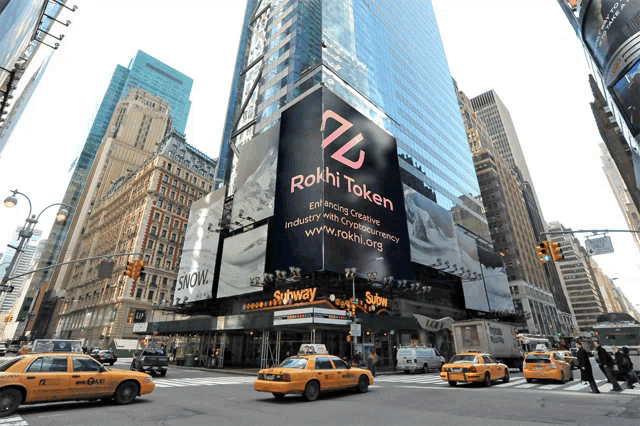 a large billboard for rokhi token sits on the side of a building