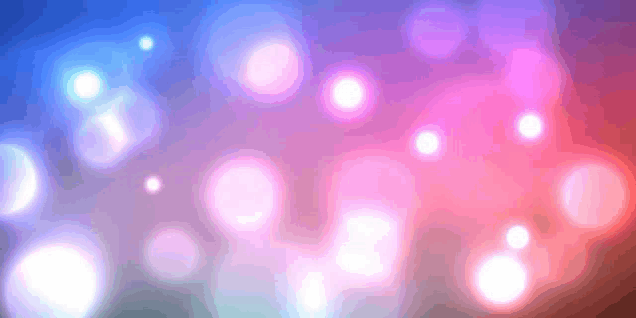 a blue and pink background with circles of light