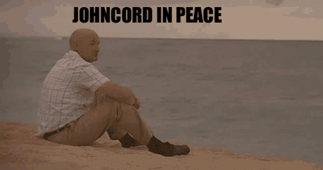 a man sits on a beach with the words johncord in peace written above him
