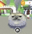 a close up of a cat 's face in a video game with buildings in the background .