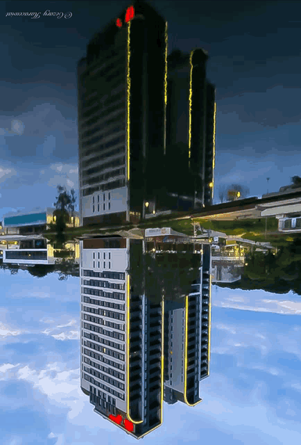 a reflection of a tall building in a body of water with a caption that says ' george monserrat '