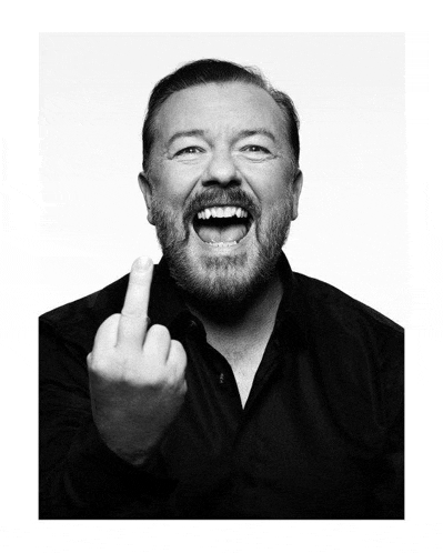 a man with a beard is giving the middle finger in a black and white photo