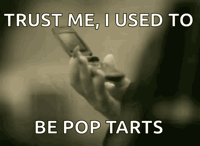 a person holding a flip phone with the words trust me i used to be pop tarts