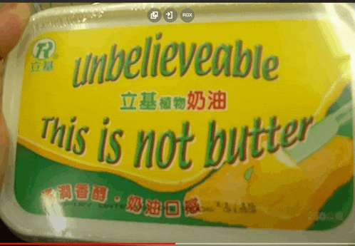 someone is holding a can of butter that says " unbelievable this is not butter "