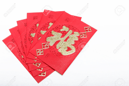 a stack of red envelopes with chinese symbols on them stock photo