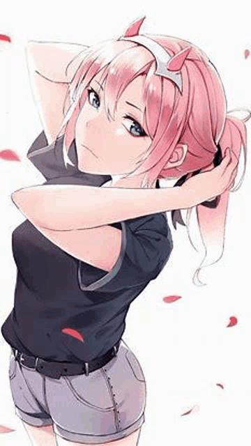 a girl with pink hair and horns is wearing shorts and a headband .