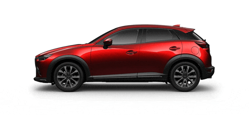 a red mazda cx 3 is shown from the side