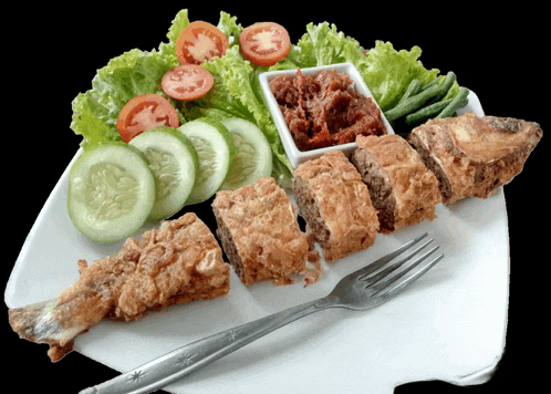 a plate of food with vegetables and a fork