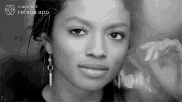 a black and white photo of a woman 's face made with the reface app