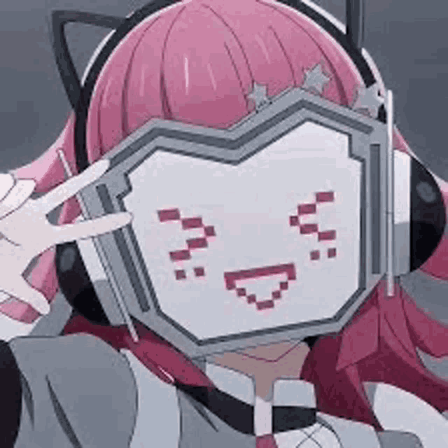 a girl with pink hair is wearing headphones and covering her face with a smiley face .