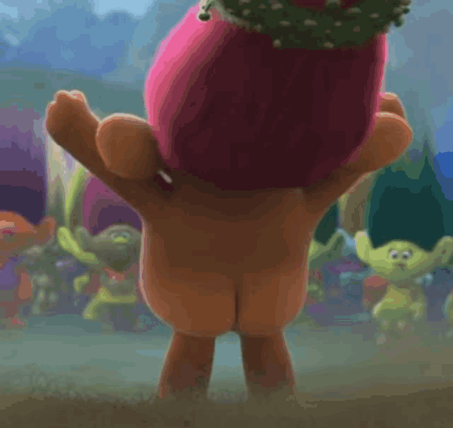 a naked troll with a crown on his head is standing in the grass