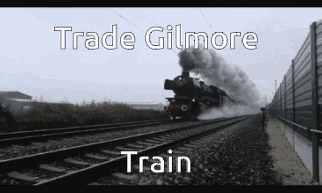 a picture of a train with the words trade gilmore train