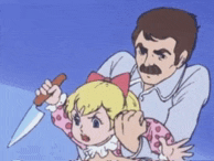 a man is holding a little girl while she holds a knife