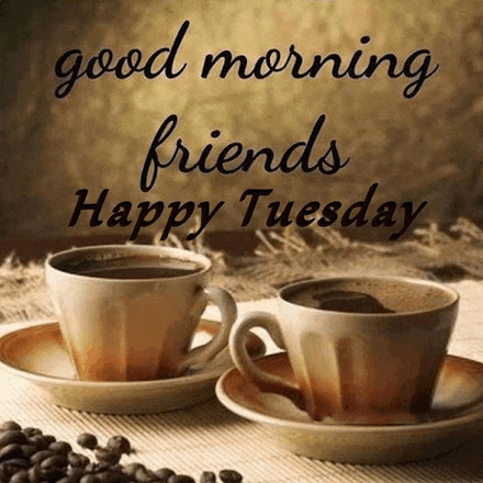 two cups of coffee on a saucer on a table with a good morning friends happy tuesday message .