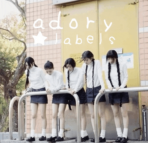 a group of girls standing next to each other with the words adory labels written on the bottom