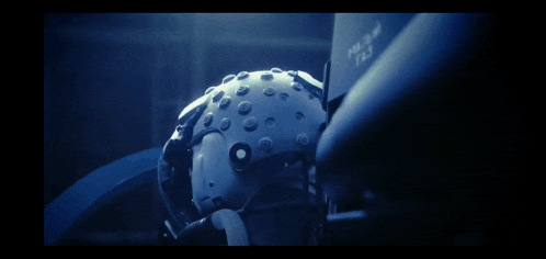 a close up of a helmet that says t.j. on it