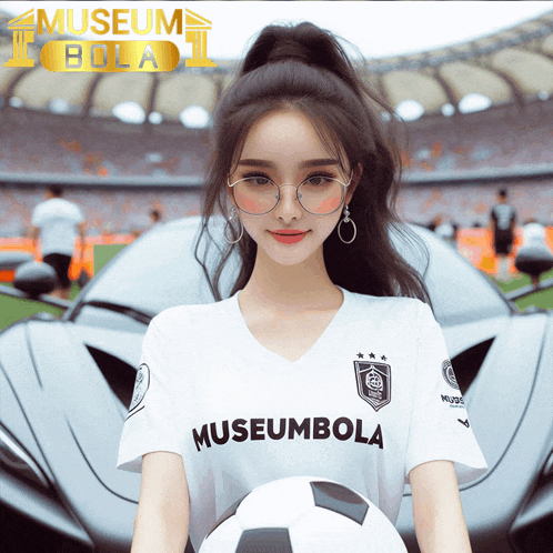 a woman holding a soccer ball in front of a museum bola logo