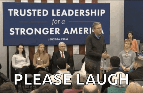 a group of people sitting in front of a sign that says " trusted leadership for a stronger america "