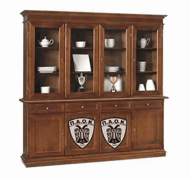 a wooden cabinet with plates , cups , and a trophy on it .