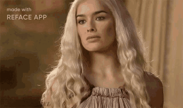 a woman with long blonde hair is standing in front of a window .